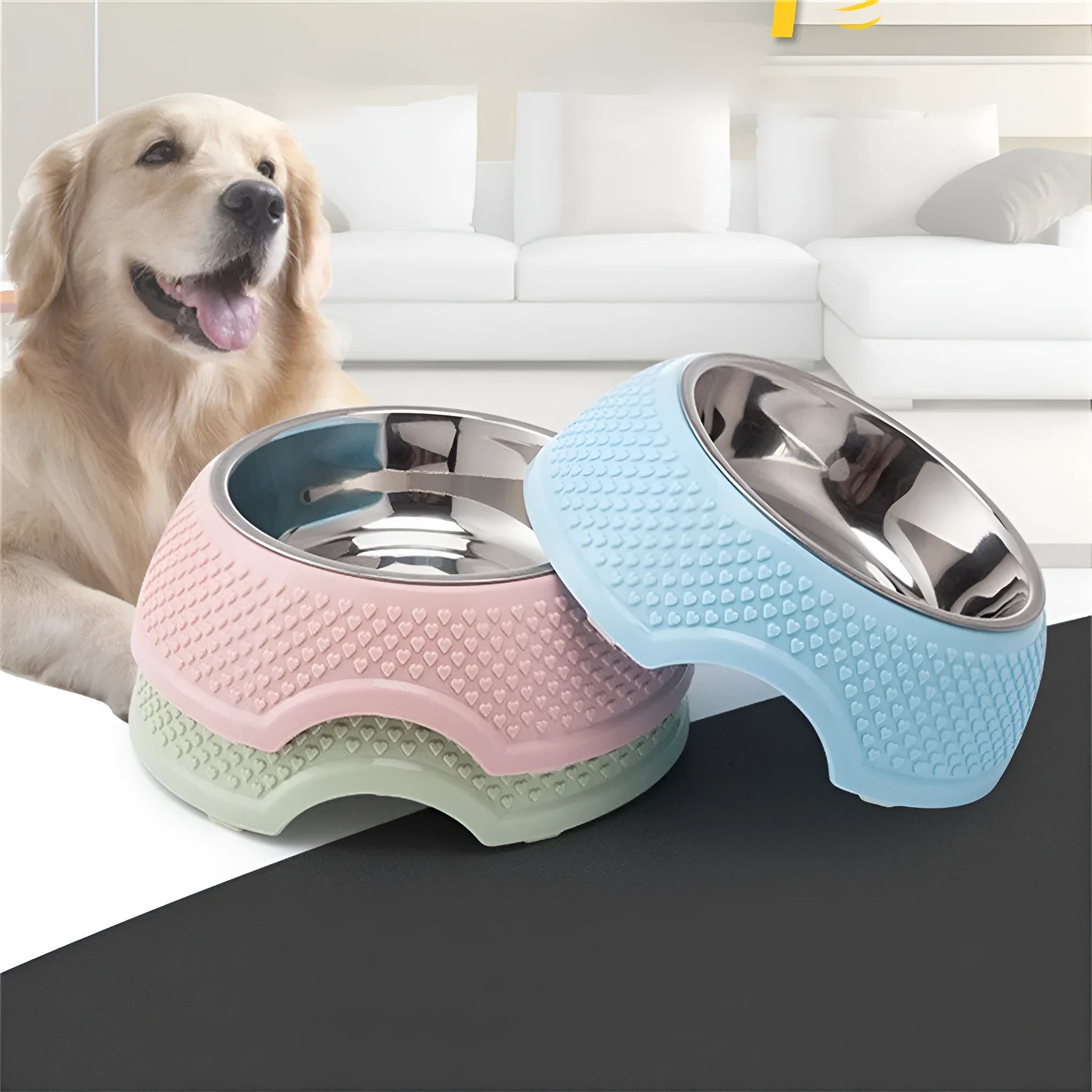 Blue stainless steel pet bowl with non-slip base on a floor.
