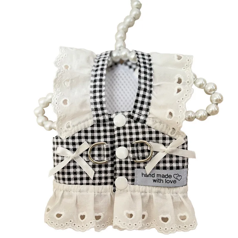 Pet dog cat thin chest back traction pastoral skirt in black and white plaid cloth material on a small dog