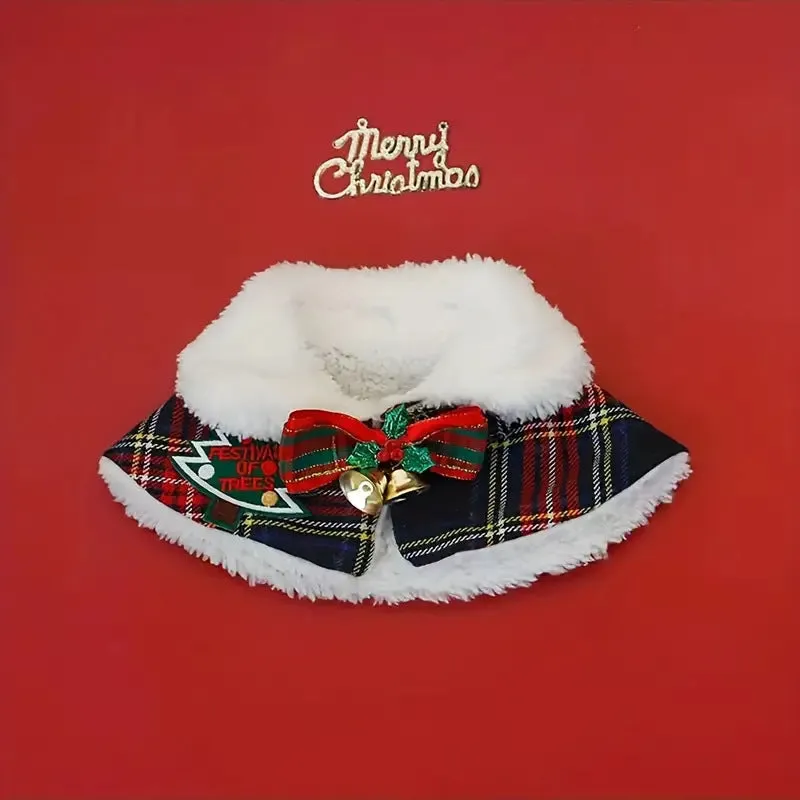 Red festive pet scarf with bell design on a dog, showing the polyester material and cloak-style fit.