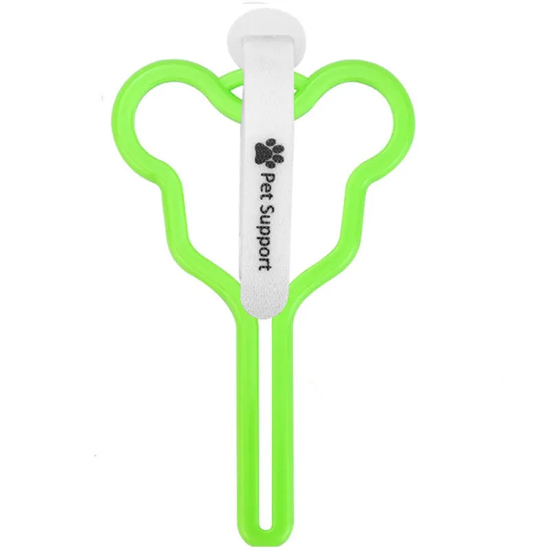 A hands-free dog poop bag holder with a fixed metal clip and a black Velcro strap for leash attachment.