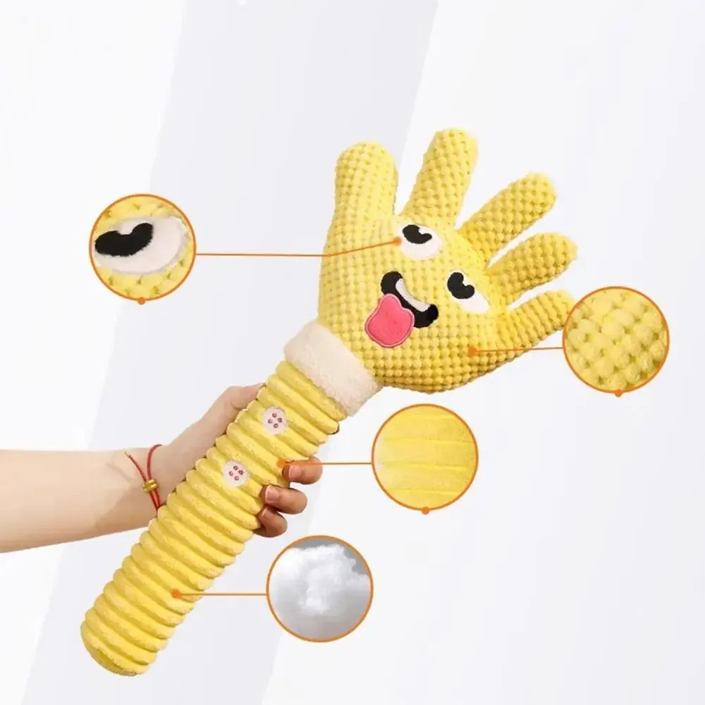 Yellow palm-shaped plush dog teething toy with squeaker for puppies