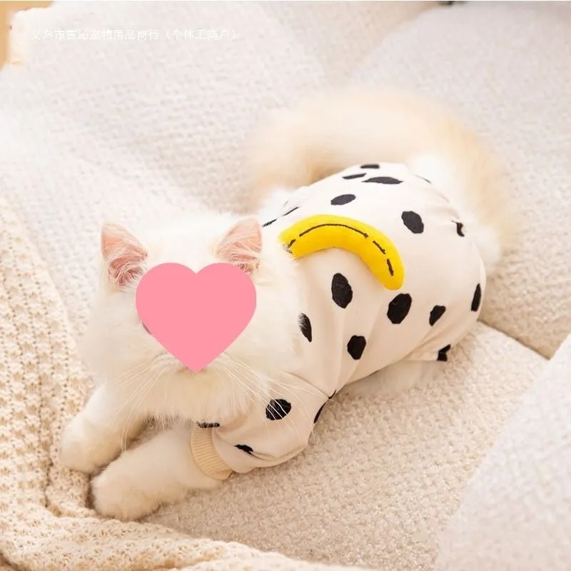 Cute Kitty anti-lint Dralon pet coat in white polka dot banana pattern on a cat, side view