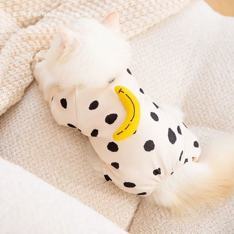 Cute Kitty anti-lint Dralon pet coat in white polka dot banana pattern on a cat, side view