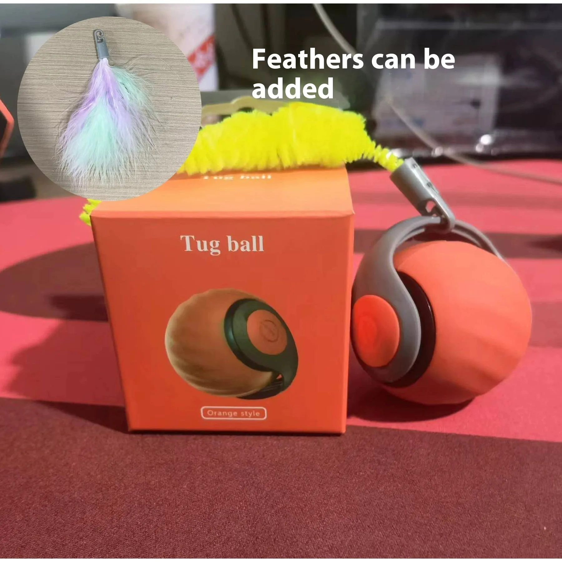 Automatic cat toy car with silicone spike ball in blue rolling on wooden floor