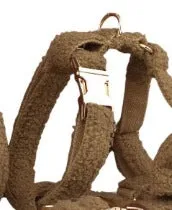 Brown polyester dog necklet set with collar, leash, bow, and vest on a hand-holding rope