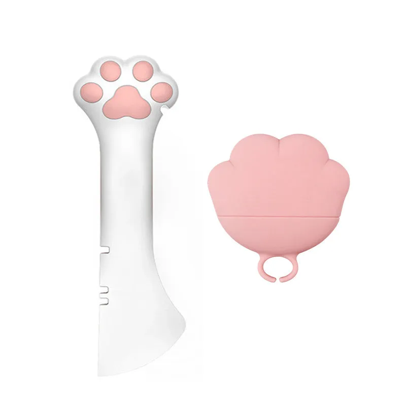 Multifunction silicone pet food spoon and can opener with pink lid, 5.1 inches long, paw-shaped scoop, white background