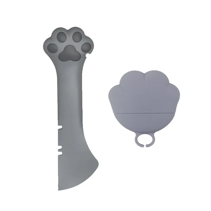 Multifunction silicone pet food spoon and can opener with pink lid, 5.1 inches long, paw-shaped scoop, white background