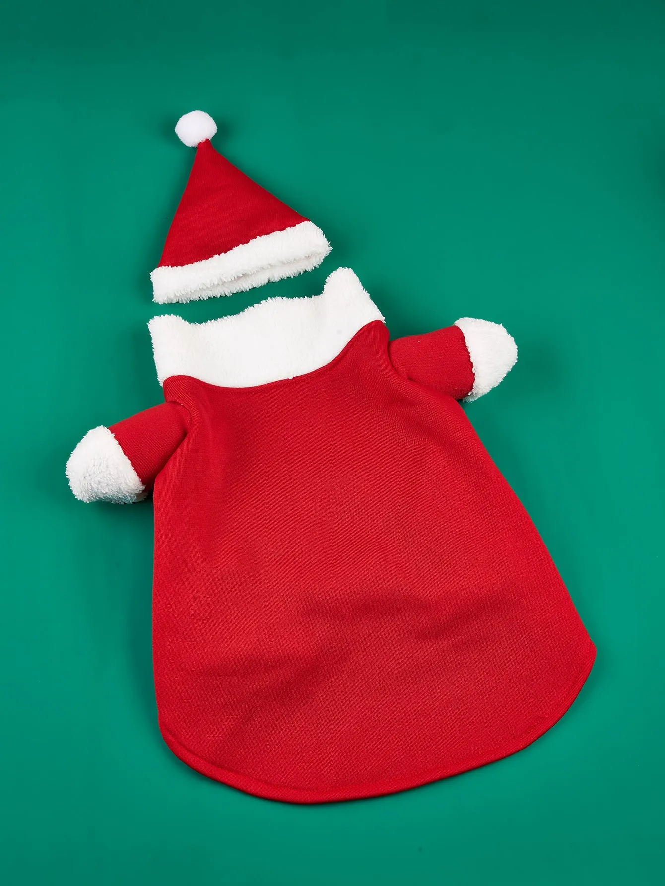 Red polyester Christmas pet costume on a small dog with matching cap
