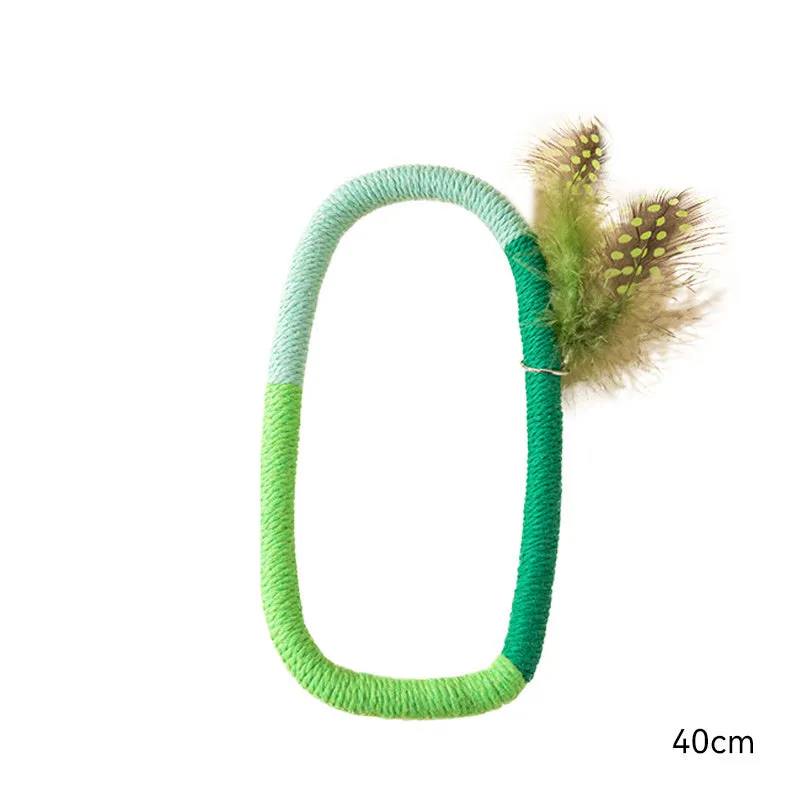 Green circular cotton rope cat toy with feathers and catnip for chewing and interactive play