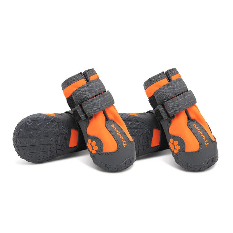 Pair of non-slip waterproof luminous dog shoes in black with double velcro closure