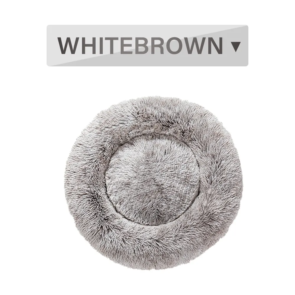 Fluffy donut dog bed in light grey with long plush texture and raised rim