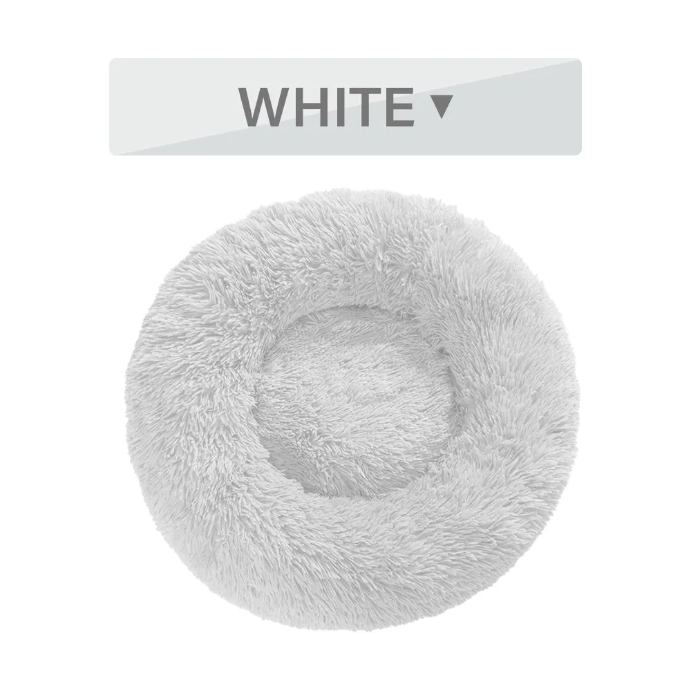 Fluffy donut dog bed in light grey with long plush texture and raised rim