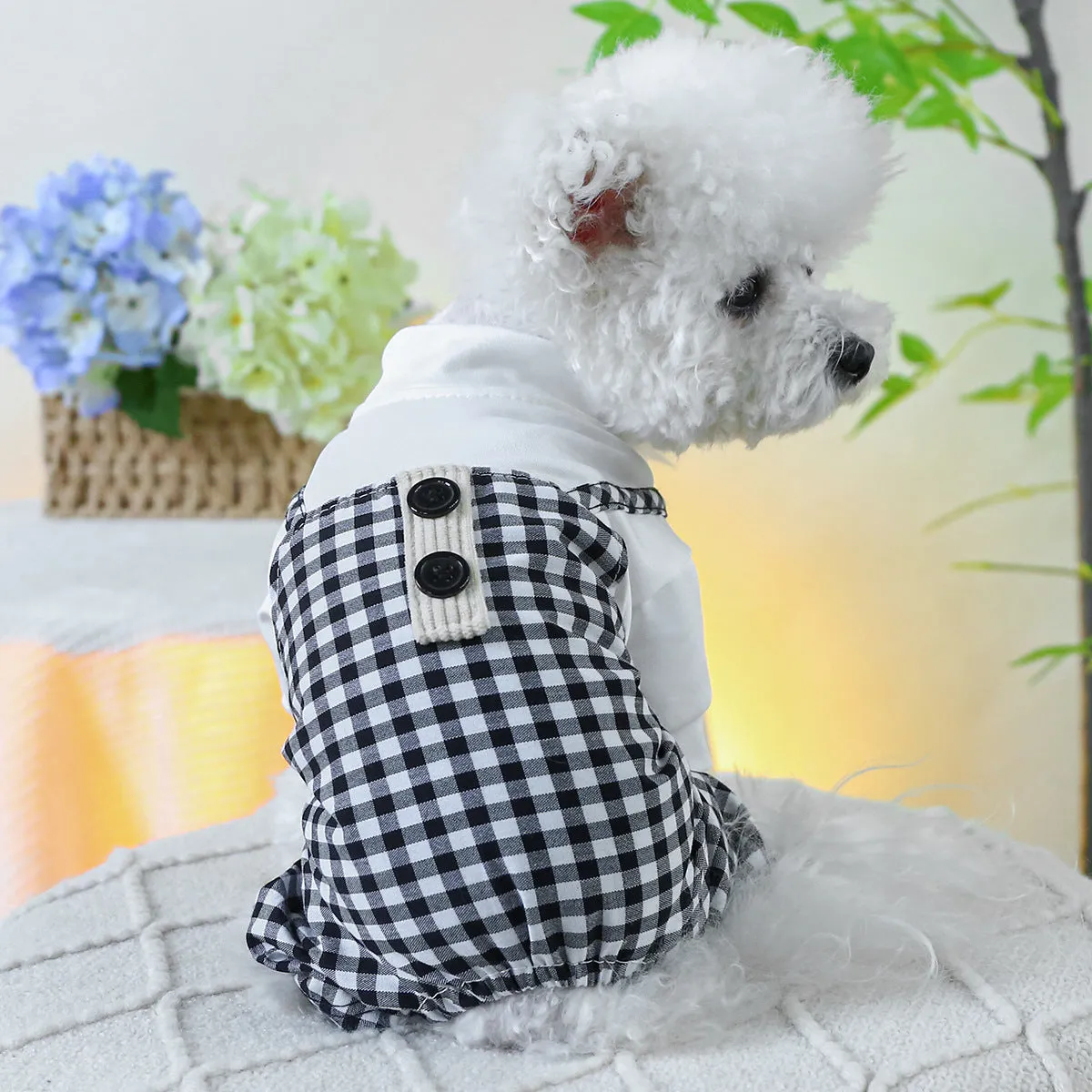 Fashion pet dog plaid overalls in black and white suspender style on a dog, polyester material