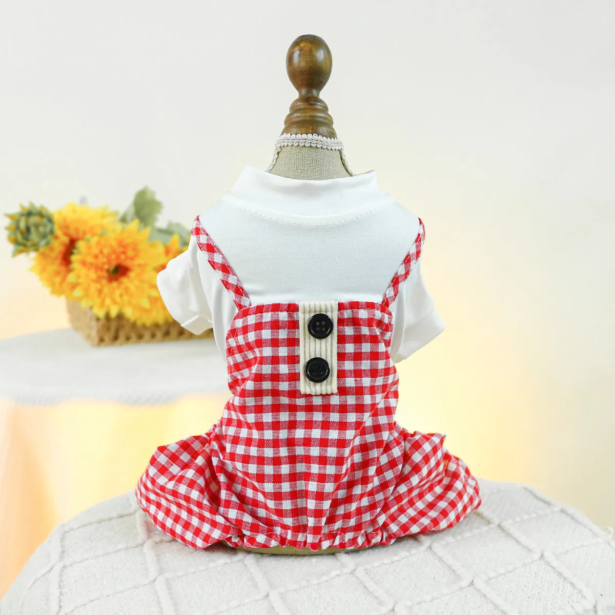 Fashion pet dog plaid overalls in black and white suspender style on a dog, polyester material