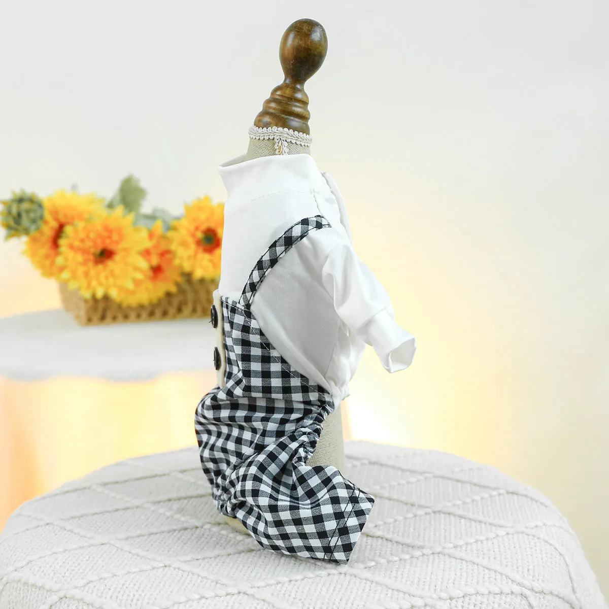 Fashion pet dog plaid overalls in black and white suspender style on a dog, polyester material