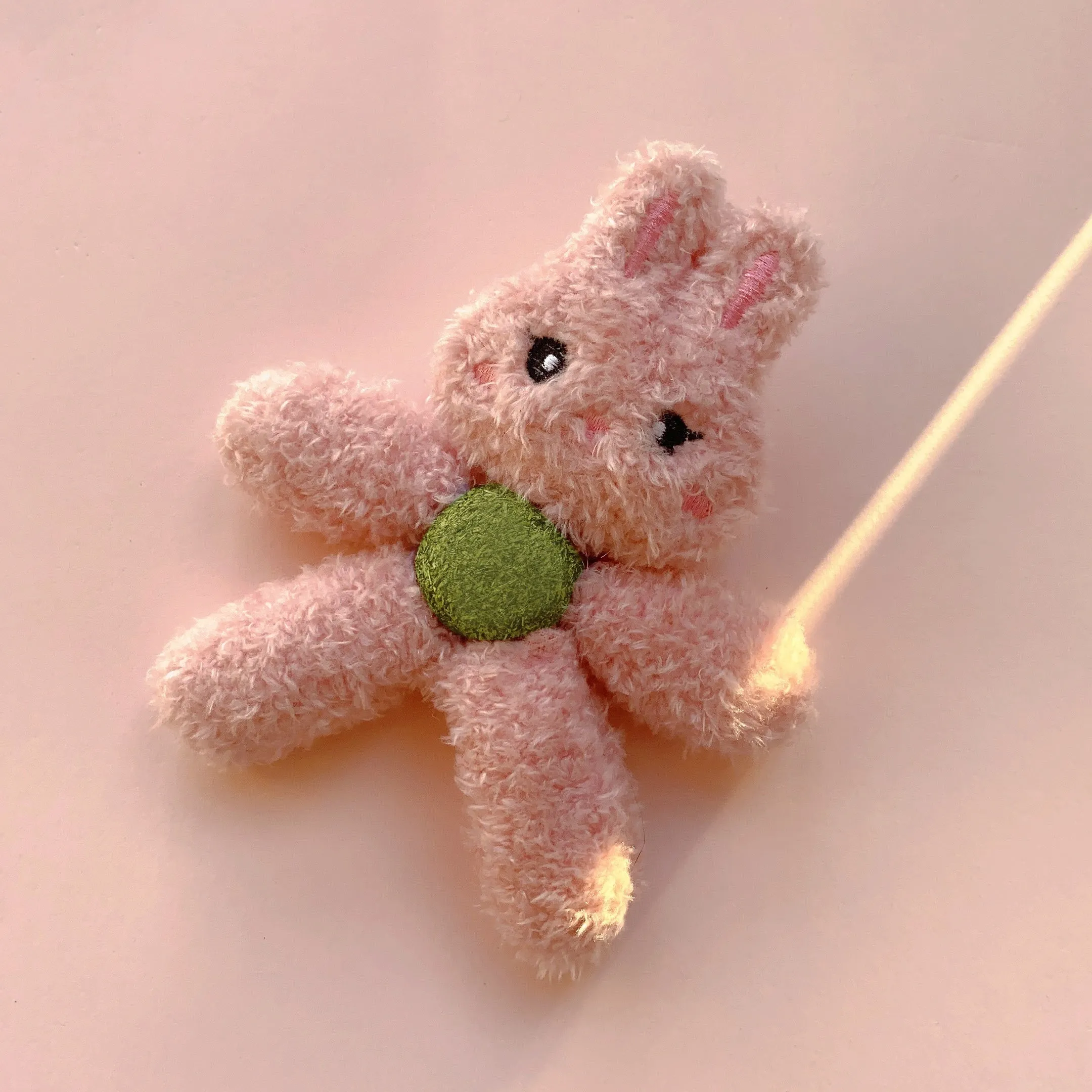 Catnip ball chewing toy in animal designs for feline dental play and entertainment