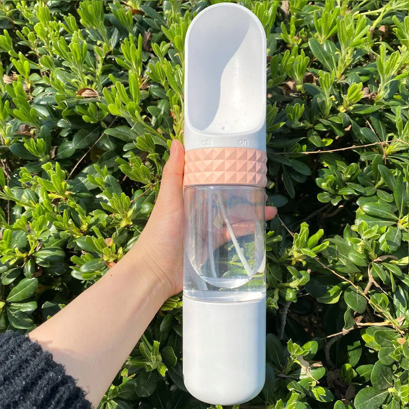 Portable dog water cup with one-click lock, food-grade ABS construction, available in various colours for outdoor pet hydration