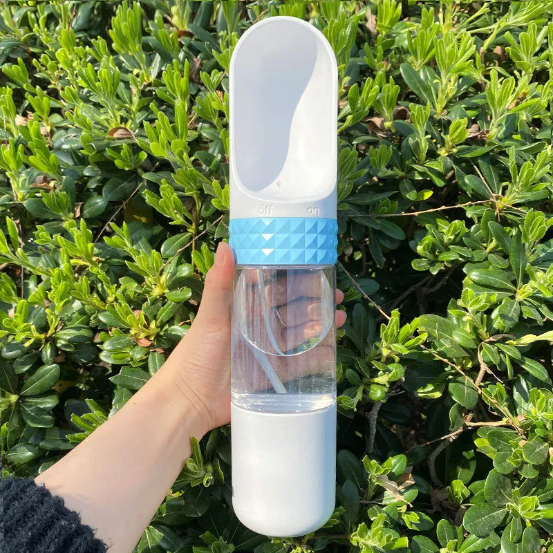 Portable dog water cup with one-click lock, food-grade ABS construction, available in various colours for outdoor pet hydration