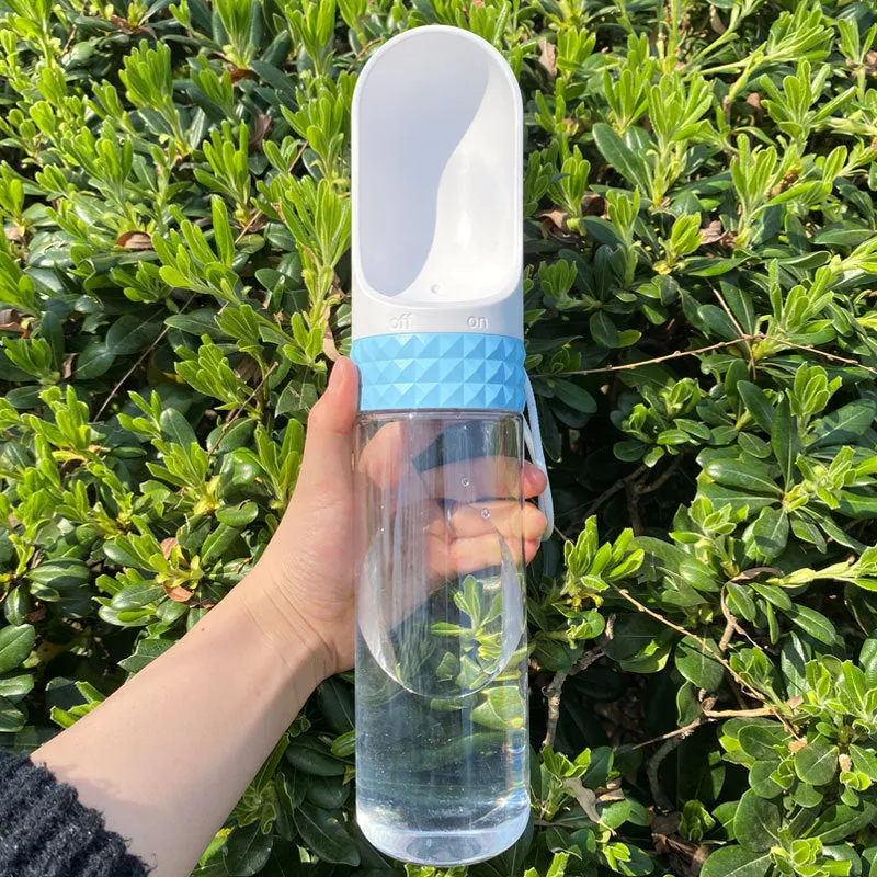 Portable dog water cup with one-click lock, food-grade ABS construction, available in various colours for outdoor pet hydration