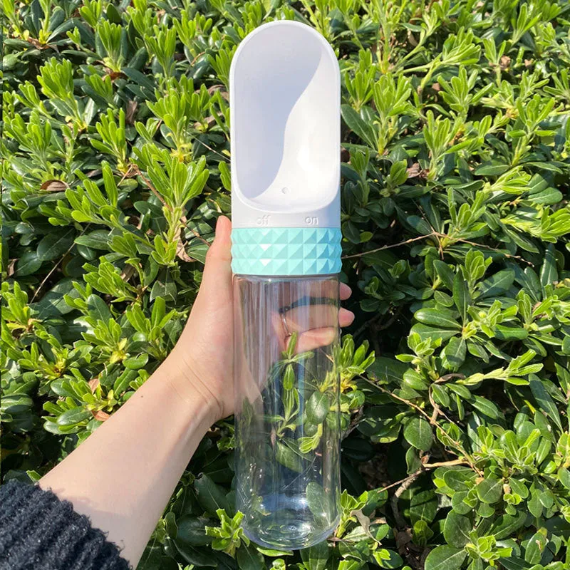 Portable dog water cup with one-click lock, food-grade ABS construction, available in various colours for outdoor pet hydration