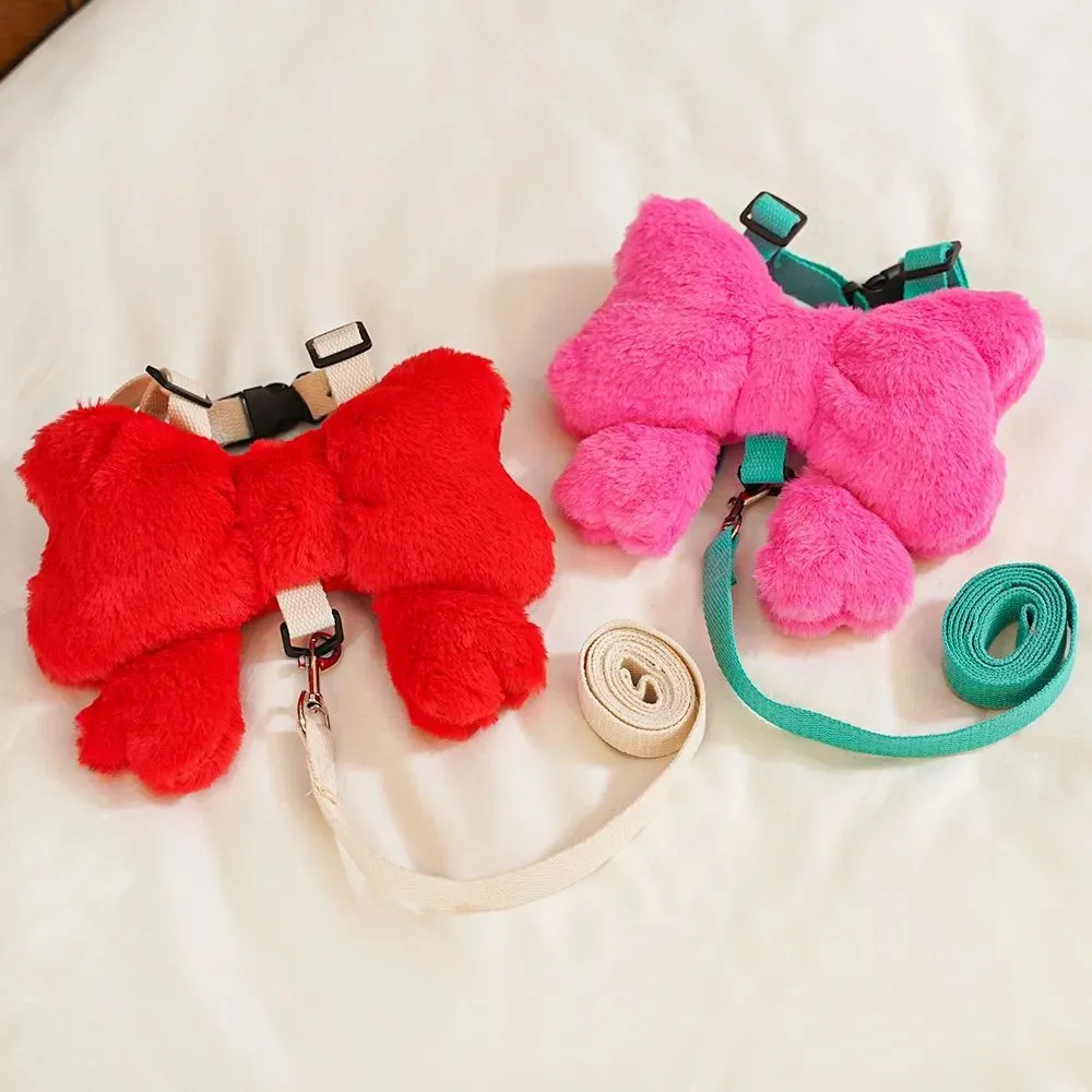 Pet bow chest strap traction rope in pink, size M, on a small dog with cute bow on back