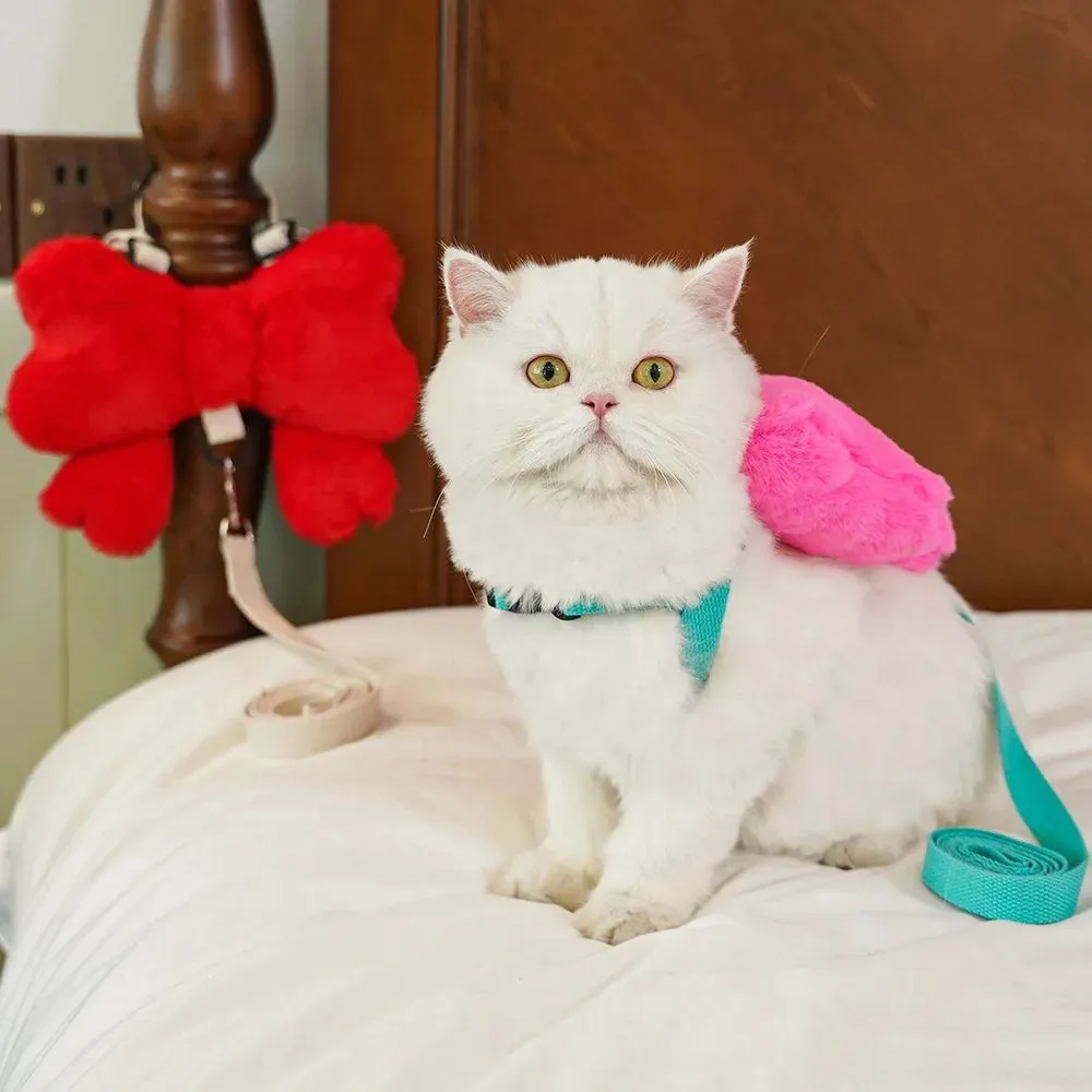 Pet bow chest strap traction rope in pink, size M, on a small dog with cute bow on back
