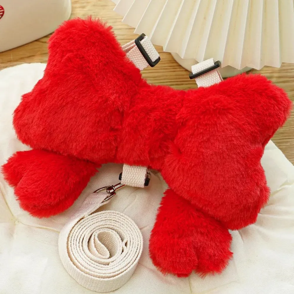 Pet bow chest strap traction rope in pink, size M, on a small dog with cute bow on back