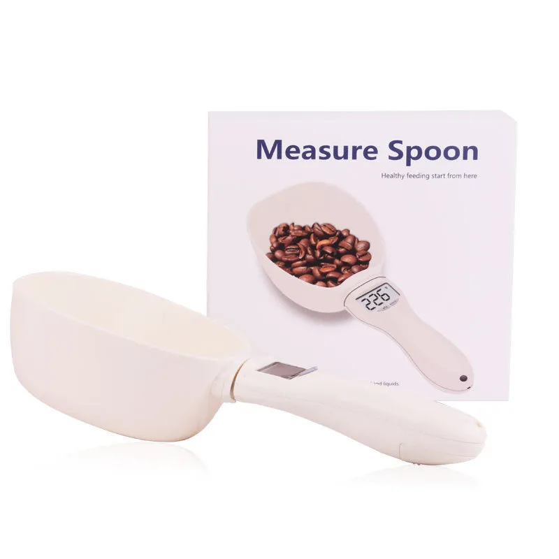 White ABS plastic smart weighing pet food shovel with digital display, 250ml capacity, 23cm length.