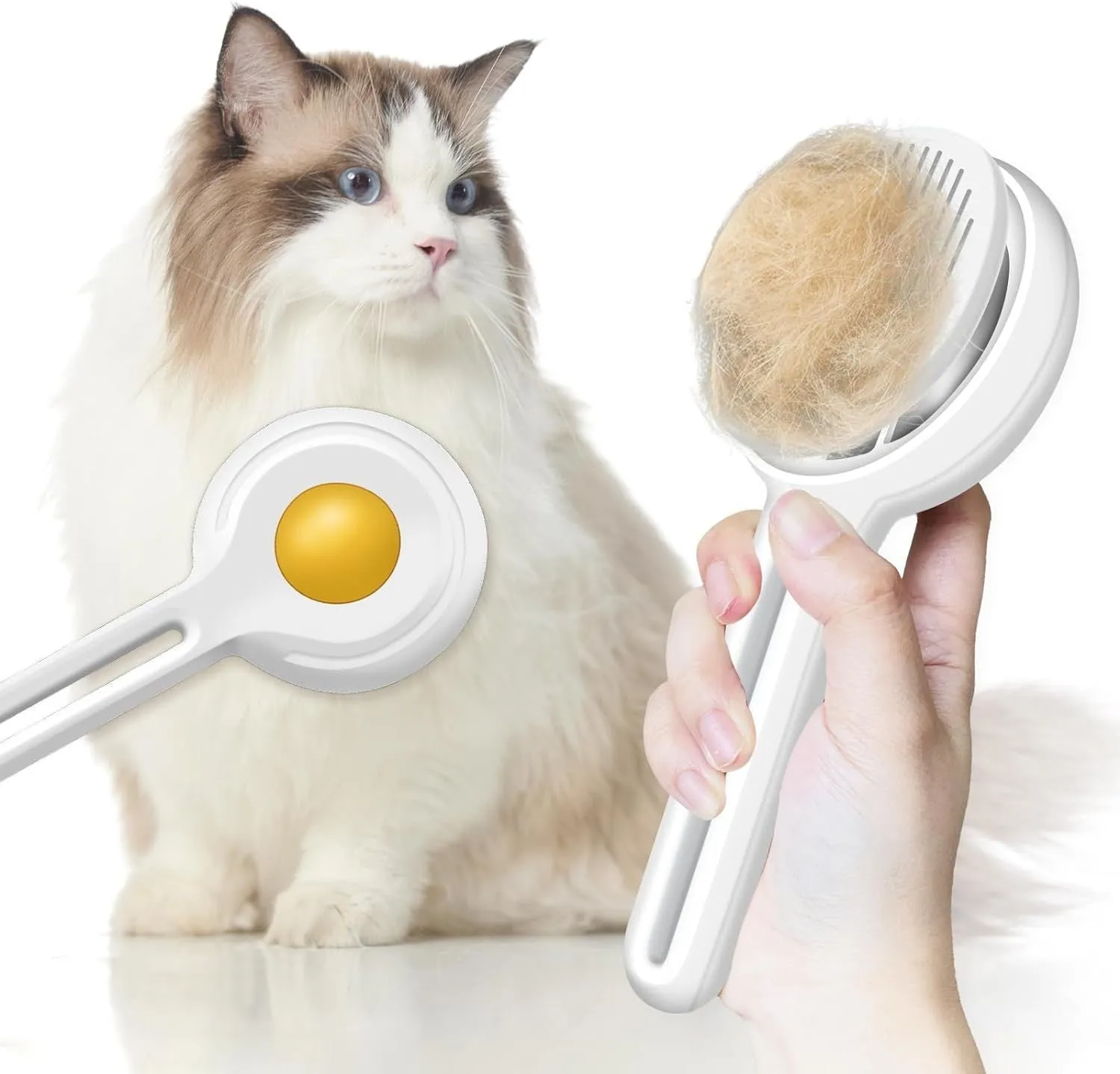 Yellow cat brush with release button and stainless steel bristles on a light background