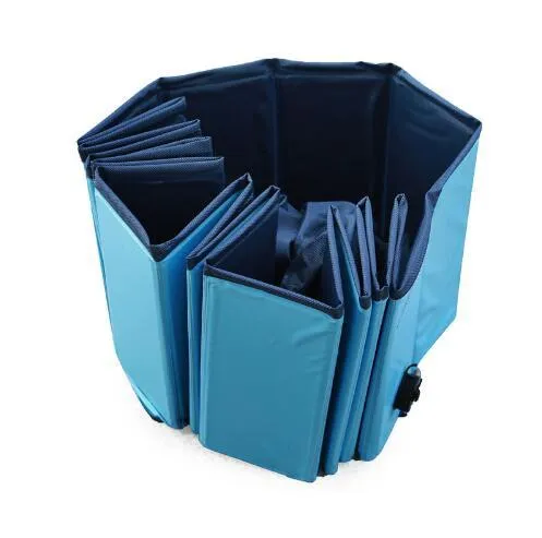 Foldable blue dog swimming pool with thickened PVC material and quick drain valve, set up on grass
