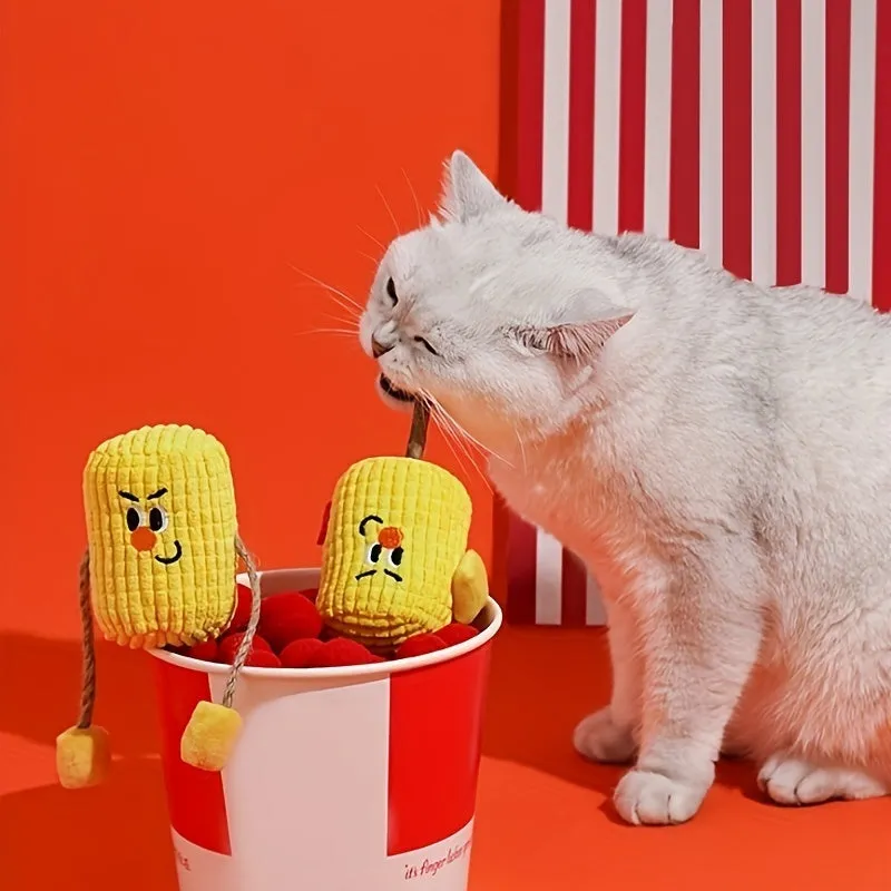 Polio wood corn cob shaped cat chew toy for dental health on a white background.