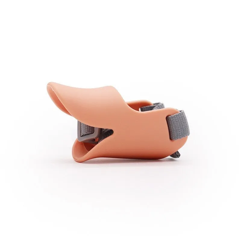Blue TPR dog duckbill muzzle mouth cover for small to medium dogs, side view on light background