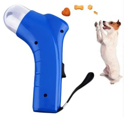 Pet food catapult feeder fun dog toy treat launcher with wrist strap on blue background