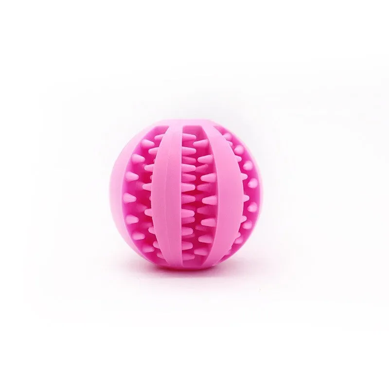 Small pink rubber pet dog toy self-hi relieving stuffy molars chew toy 5cm diameter on white background