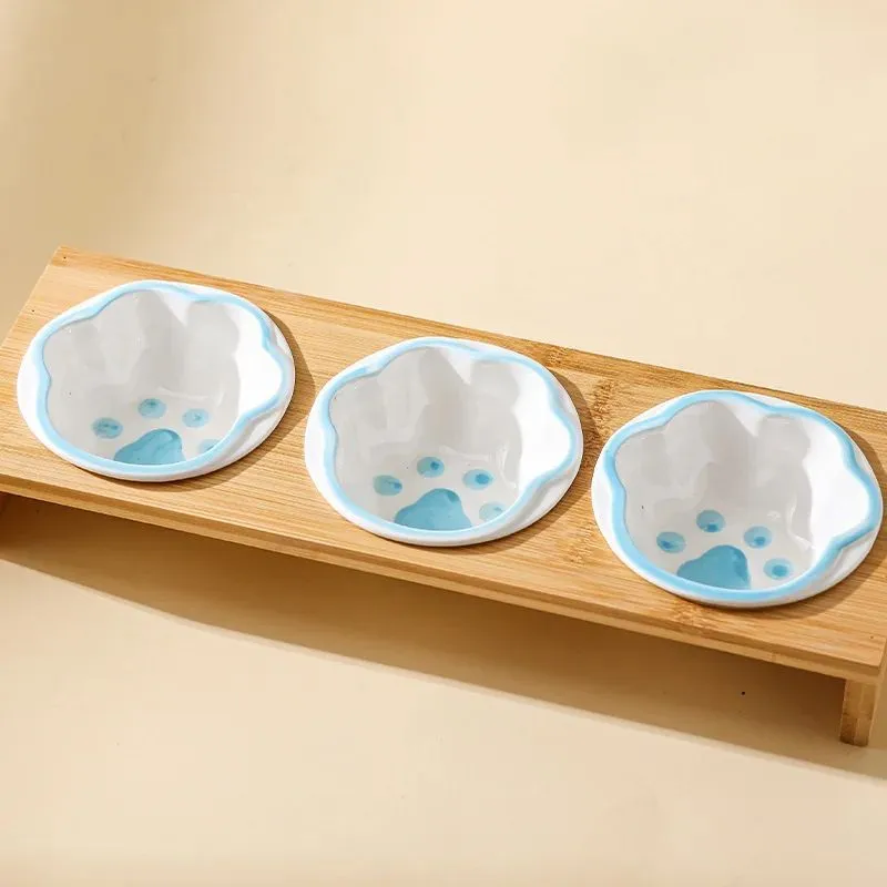 Raised bamboo frame ceramic pet bowl set for small cats and dogs in blue, reducing neck strain during eating