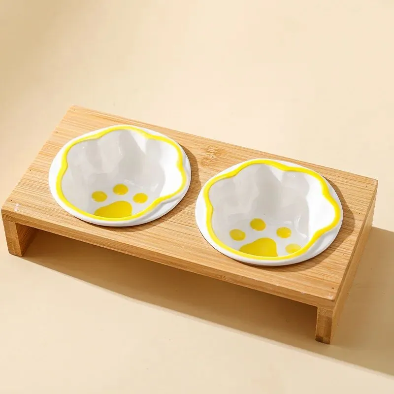 Raised bamboo frame ceramic pet bowl set for small cats and dogs in blue, reducing neck strain during eating