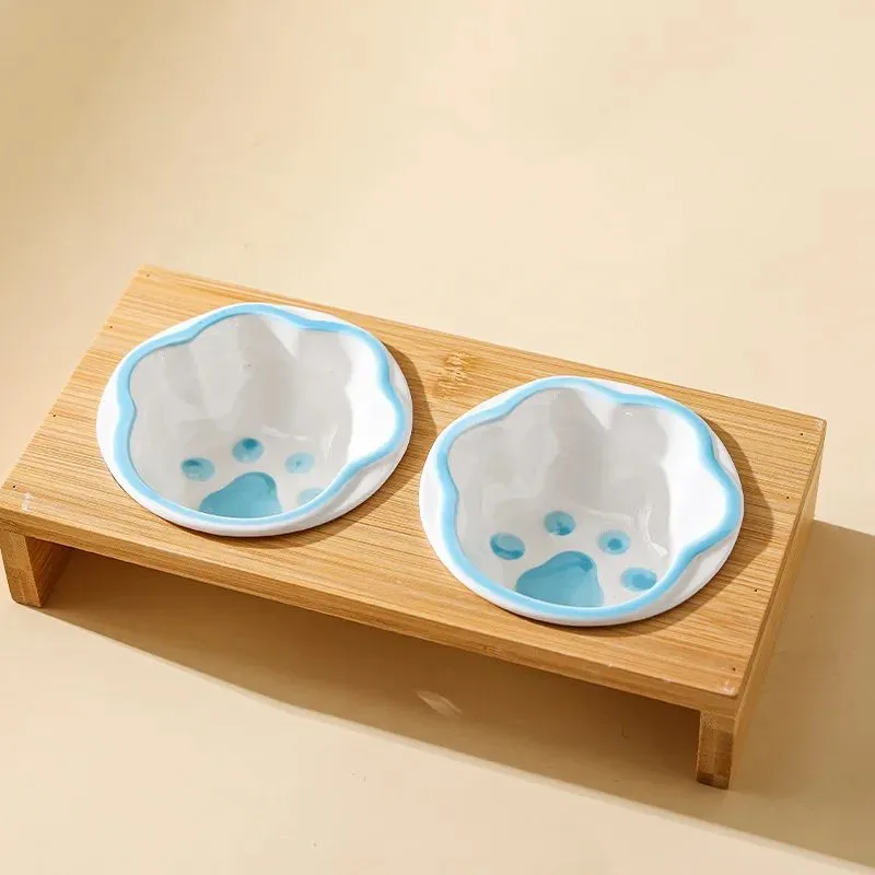 Raised bamboo frame ceramic pet bowl set for small cats and dogs in blue, reducing neck strain during eating