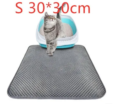 Beehive cat litter mat in gray with honeycomb textured EVA surface and quilted edge