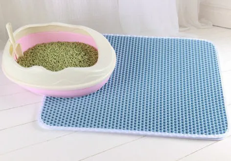 Beehive cat litter mat in gray with honeycomb textured EVA surface and quilted edge