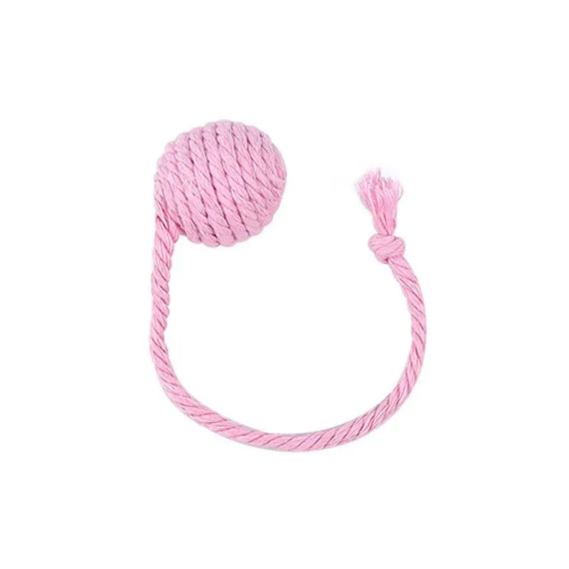 Colourful cat toy ball with attached rope and internal bell, shown in green, pink, purple, and yellow variants.