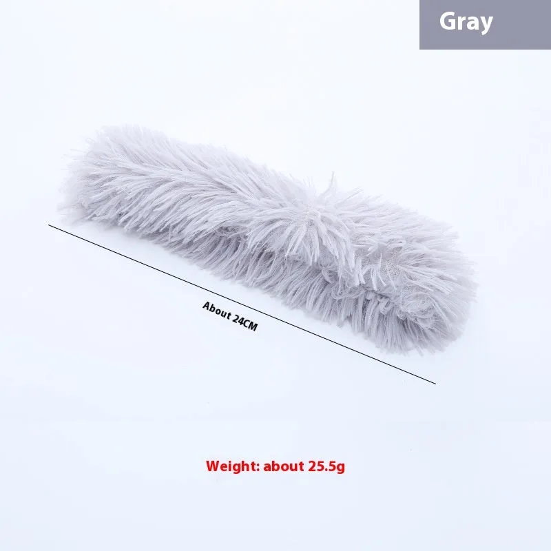 Plush cat toy containing catnip and ringing paper, about 30cm long, available in multiple colours