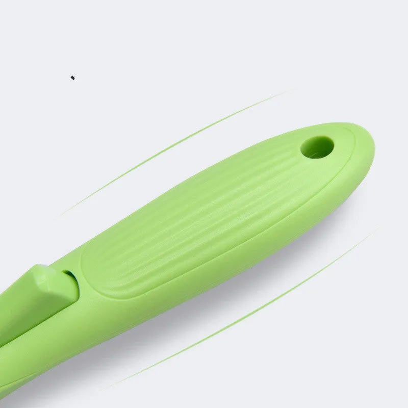 Fruit green automatic pet hair removal brush with ABS and TRP handle on white background