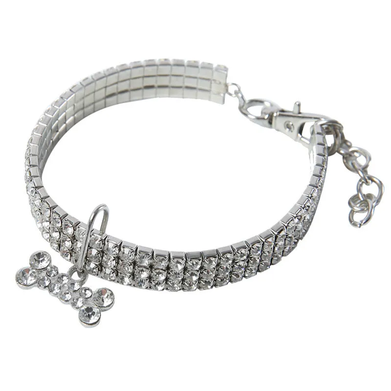 Bling rhinestone dog collar with crystal pendant on a small dog, blue colour, adjustable size S