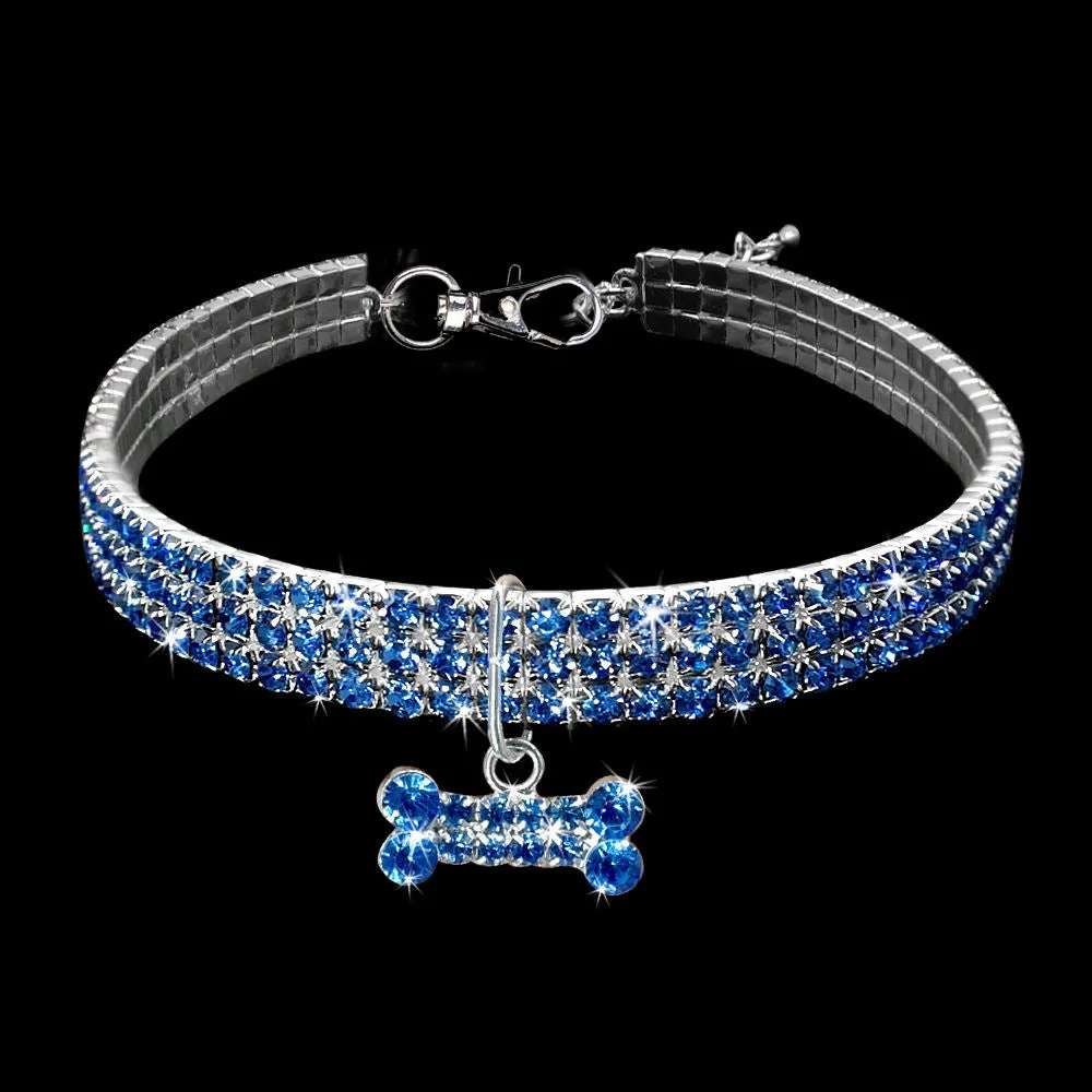 Bling rhinestone dog collar with crystal pendant on a small dog, blue colour, adjustable size S
