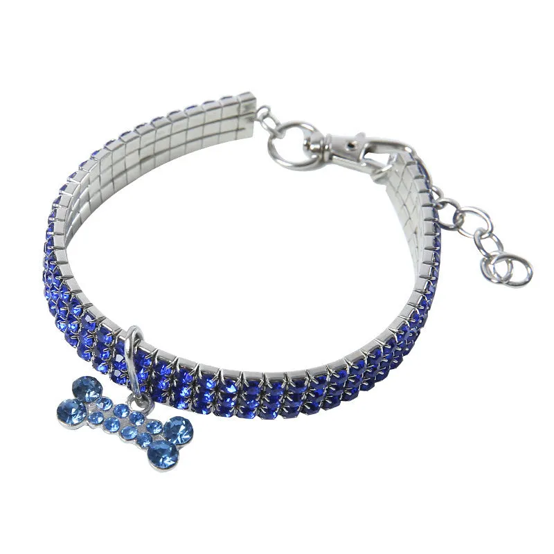 Bling rhinestone dog collar with crystal pendant on a small dog, blue colour, adjustable size S