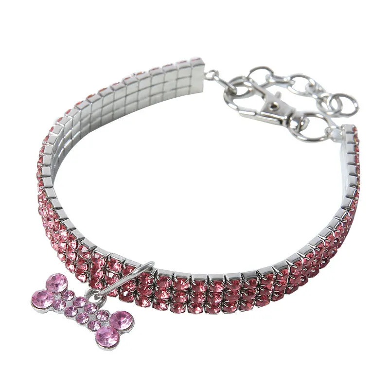 Bling rhinestone dog collar with crystal pendant on a small dog, blue colour, adjustable size S