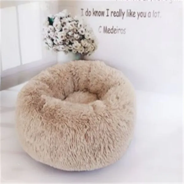 Round long-hairy pet bed in soft plush with 4cm pile, non-slip bottom, suitable for cats and dogs