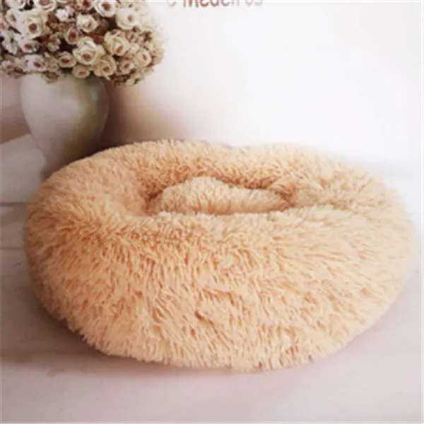 Round long-hairy pet bed in soft plush with 4cm pile, non-slip bottom, suitable for cats and dogs