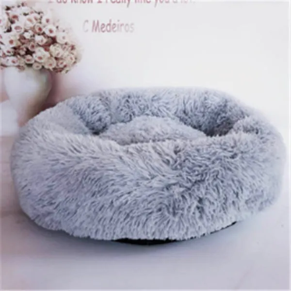 Round long-hairy pet bed in soft plush with 4cm pile, non-slip bottom, suitable for cats and dogs