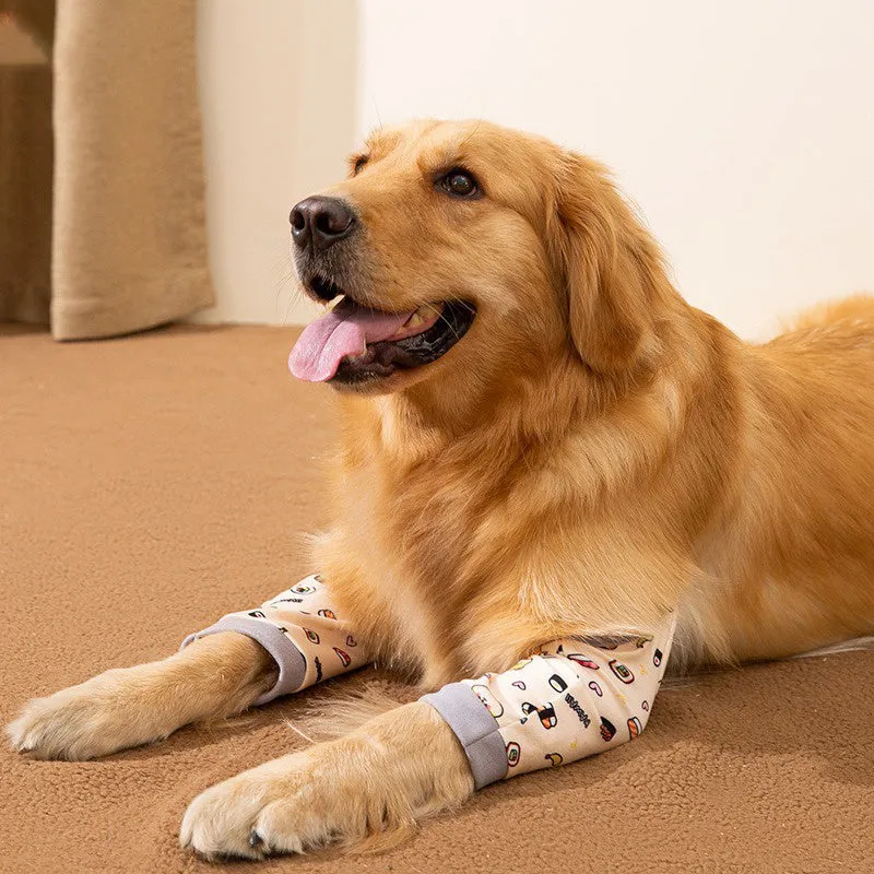Blue adjustable dog knee protector sleeve with padded elbow patch and matching scarf laid flat.